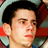 Static 48x48 pixel buddy icon showing a close-up of a person's face with dark hair, light skin tone, and red lips against a blurred background with red and blue tones.