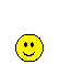 Yellow circular smiley face with black eyes and mouth, two versions showing different head positions relative to a yellow jester hat.