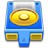 Blue mechanical device with golden circular component and two rectangular slots, rendered in pixelated style.