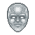 Pixelated silver mask with smooth rounded edges, featuring white rectangular eye sections, a small nose, and a straight mouth line on a gray background.