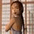 A 50x50 pixel animated buddy icon featuring a Tomb Raider character in two frames, with green text branding on the right side of a contact sheet layout.