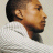 Static 48x48 pixel icon showing a close-up profile of a person with short dark hair wearing a white collared shirt against a light background.
