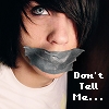 A person with dark hair and a white shirt has gray tape over their mouth, with pixelated text reading "Don't Tell Me..." on the right side of the image.