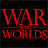 Static pixelated icon featuring bold red text "WAR OF THE WORLDS" on a black background with horizontal dividing line between lines of text.