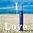 A beach scene with a volleyball net and ball, featuring text overlays reading "I Love Volleyball" in white and pink lettering.