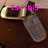 A silver flip phone on a brown surface with pink text reading "Is this" and "phone" in top , changing to "BUSTED?!!!" below