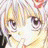 A pixelated anime-style character face with light hair and a flower accessory on the right side of the head, next to stylized text reading "Anime IM" above smaller text "c0m" on a black background.