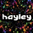 Pixelated text reads 'hayley loves you!!' over a multicolored dot pattern background with a gray rectangle on the right.