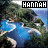 A static image of a tropical island scene with blue water, green vegetation, and sandy beaches under a light sky.