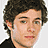 A 48x48 pixel animated contact sheet showing three frames of a character from The OC with two different headshots and an orange-and-black logo featuring "OC" text on a pink band.