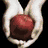 six pixelated images showing a person with brown hair in various poses and backgrounds, including hands holding a red sphere and a close-up of a face