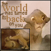 Animated icon featuring a lion cub with text 'the world has turned its back on you' and a small inset of two cubs playing, cycling through four distinct poses.