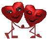 Two red heart-shaped figures with stick limbs hold hands and dance in a pixelated animation against a gray background.