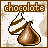Pixelated image of a chocolate kiss with whipped cream swirl, labeled 'chocolate' above on a speckled background.