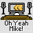 Pixel art of six computer monitors on brown desks with gray speakers, each displaying different content under "Oh Yeah Mike!" text