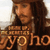 A pixelated image of a person with long brown hair and a hat, wearing dark clothing, with text overlays reading 'yo ho' in large letters.