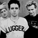 Black-and-white image of five people in a , with one person's head turning left to right across frames