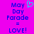 Pixelated text and heart symbol on bright pink background with blue text reading May Day Parade = LOVE! on left side.