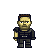 Pixel art character with light skin, brown hair, and a stern expression wearing dark tactical gear against gray background.