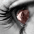A static image of three distinct eye icons arranged in a , each with unique iris colors and details