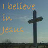 Yellow text reading "I believe in Jesus" appears on a blue sky background with a large dark cross on the right side.