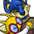 Pixelated cartoon character with blue headpiece, yellow body, and red-and-blue circular symbols on chest against white background.