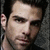 A four- shows a person with dark hair and stubble against a textured gray background, each displaying distinct facial expressions