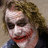 A four- with a pixelated image of a person with white face paint and red lips on the top-left, and red text on purple backgrounds in the other