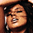 A 2x2 contact sheet of four pixelated celebrity faces with