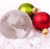 Pixelated image of two spherical ornaments on a light background, one green with a brown top, one red with a brown top.