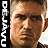 Pixelated close-up of a person's face with light brown hair, dark eyes, and a neutral expression, alongside vertical white text on a black background.