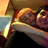 A pixelated image split into two sections: a couple embracing on the left and red text on a pink background on the right.
