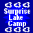 Blue background with white pixelated text 'Surprise Lake Camp' and three white heart-shaped icons arranged in a above and below the text