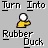 Pixelated yellow rubber duck with white eyes and black pupils, held by a hand with a white ball on top; text below reads "Rubber Duck" in pixelated font.