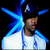 Pixelated static image of a person in white clothing with blue light effects against black background, likely from early 2000s instant messaging platform.