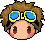 Pixel art head with brown hair, blue goggles, and pink cheeks in three expressions: smiling eyes, closed eyes, and squinting eyes.