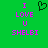 Green background with pink text reading "I LOVE U SHELBI" and a black pixelated heart symbol above the text.