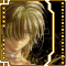 Pixelated image of a person with light brown hair styled in layers, wearing dark clothing against a black background framed by gold and white borders.