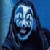 A pixelated figure with long dark hair against a blue background, showing two sequential expressions: first wide eyes and open mouth, then narrowed eyes and closed mouth.