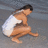 Pixelated image of a person in white underwear crouching on gray ground with pink text reading "jordan loves you! =D" on yellow background.