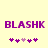 Purple pixelated text "BLASHK" on a light yellow background with two of purple and pink asterisk-like symbols below