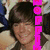 A pixelated image of a person with dark hair and a light-colored top, overlaid with colorful text in different positions across the frame.
