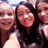 Group of people in a selfie-style photo with repeated patterns and pixelated details.