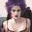 A pixelated animated sequence shows a person with purple hair in various poses wearing red sunglasses and a black-and-red outfit.