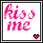 20 identical pink 'kiss me' text icons with heart symbols, each icon featuring a white background and black border
