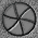 A circular icon with a gray aperture-like border and yellow center, transitioning through multiple states of opening from closed to fully open.