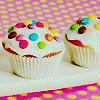 Six distinct static images arranged in a : cupcakes with colorful sprinkles, floating balloons, ice cream cones with sprinkles, rainbow paperclips, large balloons, and a swirled lollipop