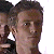 Pixelated image of a person with short brown hair against white background, adjacent to green rectangle with bright green text.
