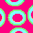Pixelated pattern of overlapping circular and diamond shapes in bright pink, light blue, green, and yellow on a solid pink background with scattered small dots.