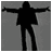 Silhouette of a person in dark clothing with arms extended horizontally, standing against a gray background.
